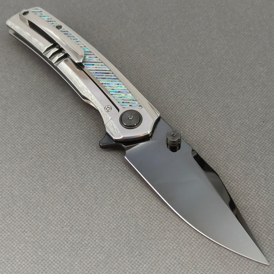 VORIXN KB103 Ocean Mirage Folding Knife – open clip side view showing pocket clip and Iridescent Mother-of-Pearl Inlaid Titanium handle