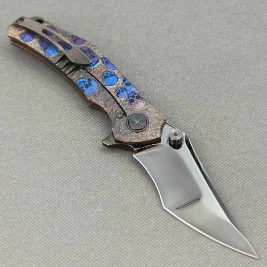 VORIXN “Skull Eclipse” Flipper & Thumb Stud Knife Titanium-Engraved Anodized Coloring Handle (4.0" 10Cr15CoMoV Blade) KB090