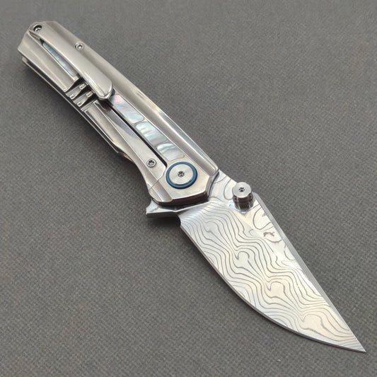 VORIXN "Ocean Mirage" Flipper & Thumb Stud Knife White Mother-of-Pearl Inlaid Titanium Handle (3.6" Damascus Blade) KB050