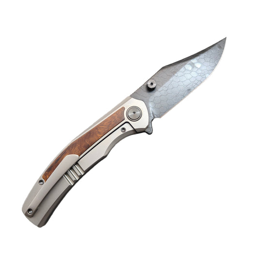 VORIXN Ironwood Crest DLC Dragon Pattern Damascus folding knife open view clip side titanium and desert ironwood handle blade angled 45 degrees