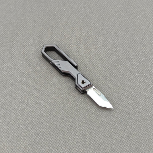 VORIXN NA005 Super Tiny Folding Knife – clip side view showing overall handle and blade