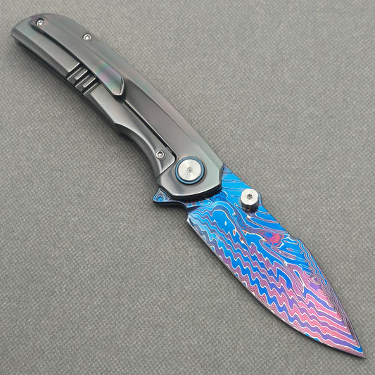 VORIXN Spectra KB127 Folding Knife – open clip side view showing pocket clip and zirconium handle