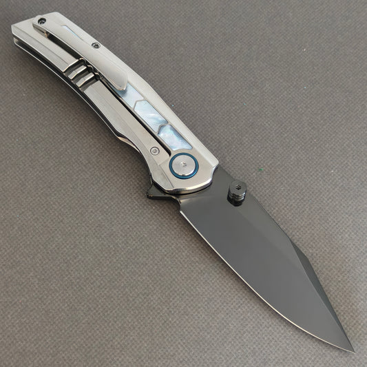 VORIXN Pearlcrest KB158 Folding Knife – open clip side view showing dark blade, pocket clip, and mother-of-pearl inlays.