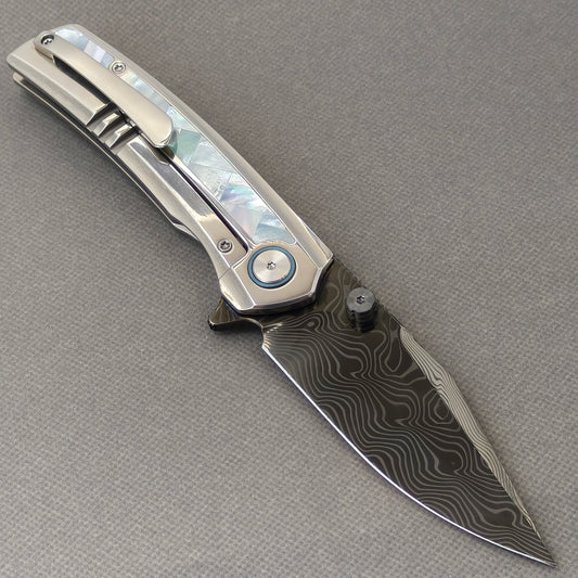 VORIXN "Ocean Mirage" Flipper & Thumb Stud Knife White Mother-of-pearl Inlaid Titanium Handle (3.8" Damascus Blade, DLC Coated) KB104