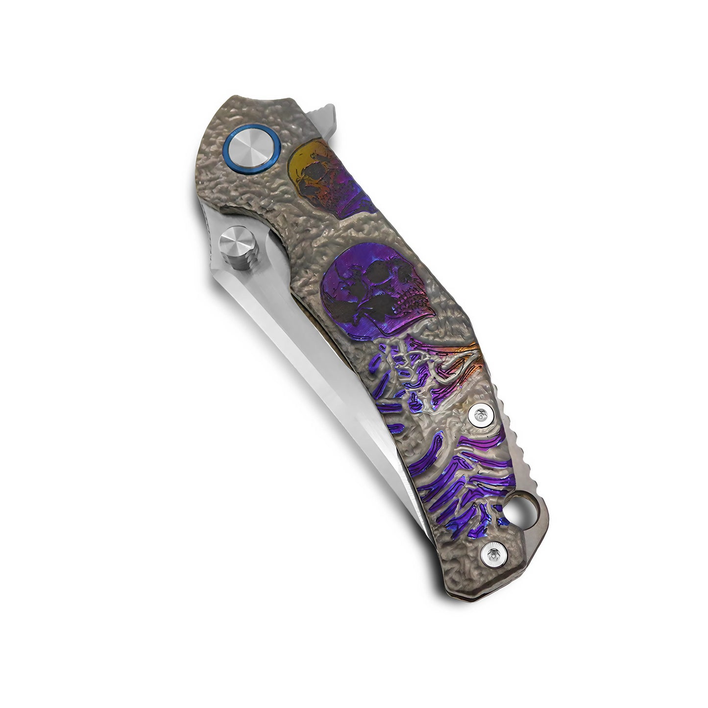 Detailed view of hand-carved titanium handle with skull motif and gradient anodized finish on VORIXN Eclipse folding knife