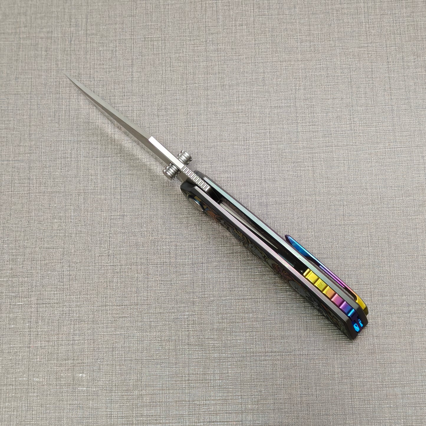 VORIXN Timeless folding knife open, top-down spine view showing blade alignment