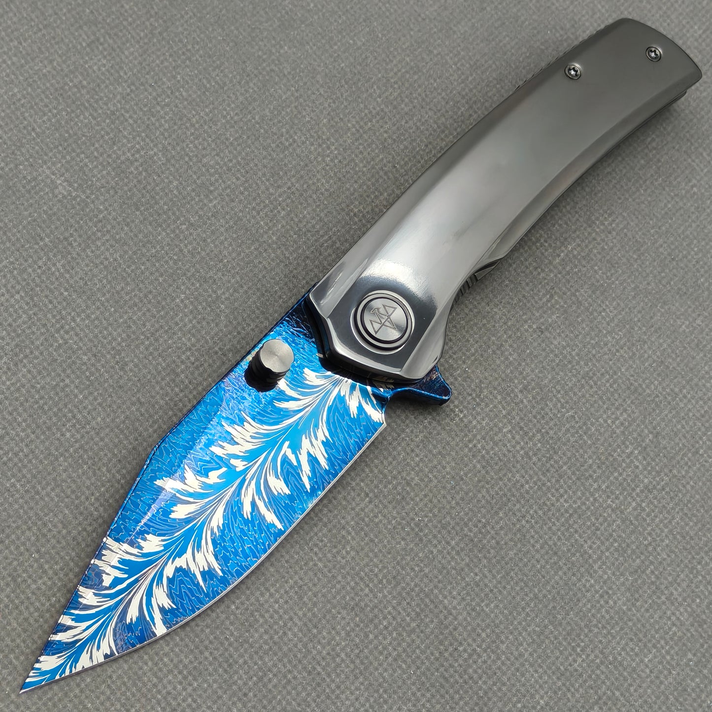 VORIXN Azure Feather hand-flamed zirconium folding knife open, non-clip side, blade angled 45° downward – KB097