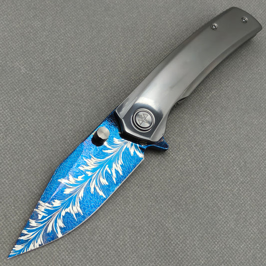 VORIXN Azure Feather hand-flamed zirconium folding knife open, non-clip side, blade angled 45° downward – KB097