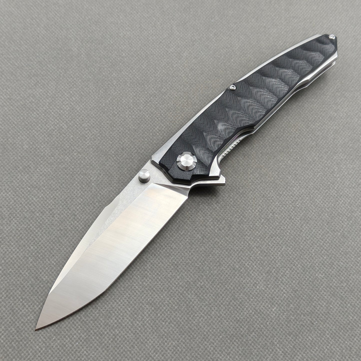 VORIXN KA009 9Cr13 stainless steel and black G10 folding knife open non-clip side view with blade, handle, and overall profile.