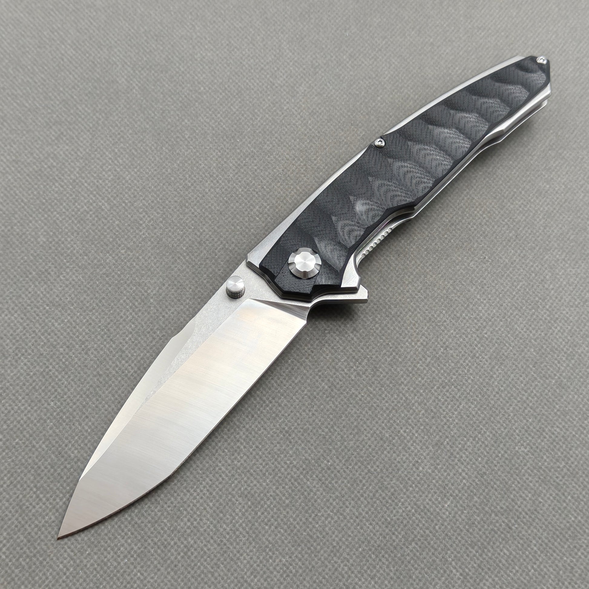 VORIXN KA009 9Cr13 stainless steel and black G10 folding knife open non-clip side view with blade, handle, and overall profile.