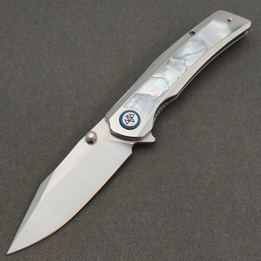 VORIXN Pearlglint KB159 folding knife, open view showing a silver-tone blade, white geometric handle inlays and blue pivot ring.