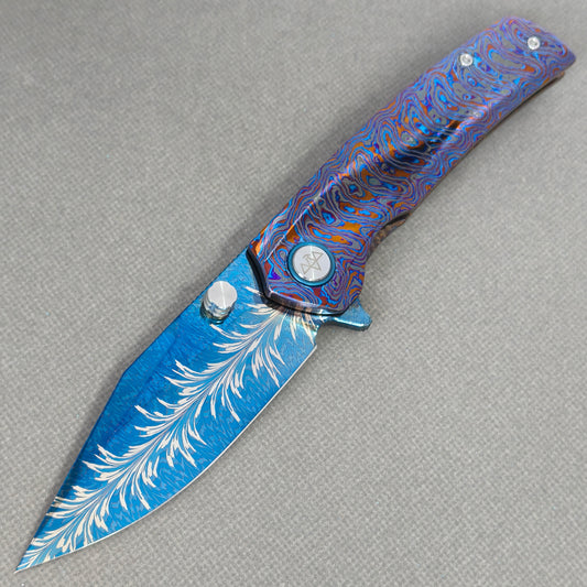 Vorixn "Aurora Bright" Flipper & Thumb Stud Knife Hand-Flamed Zirconium Handle (3.8" Feather Damascus Blade) KB081