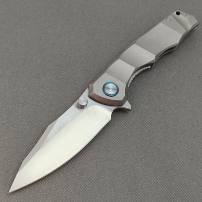 VORIXN KB014 Aegis Titan 10Cr15CoMoV titanium folding knife open non-clip side view with brushed blade and overall profile.