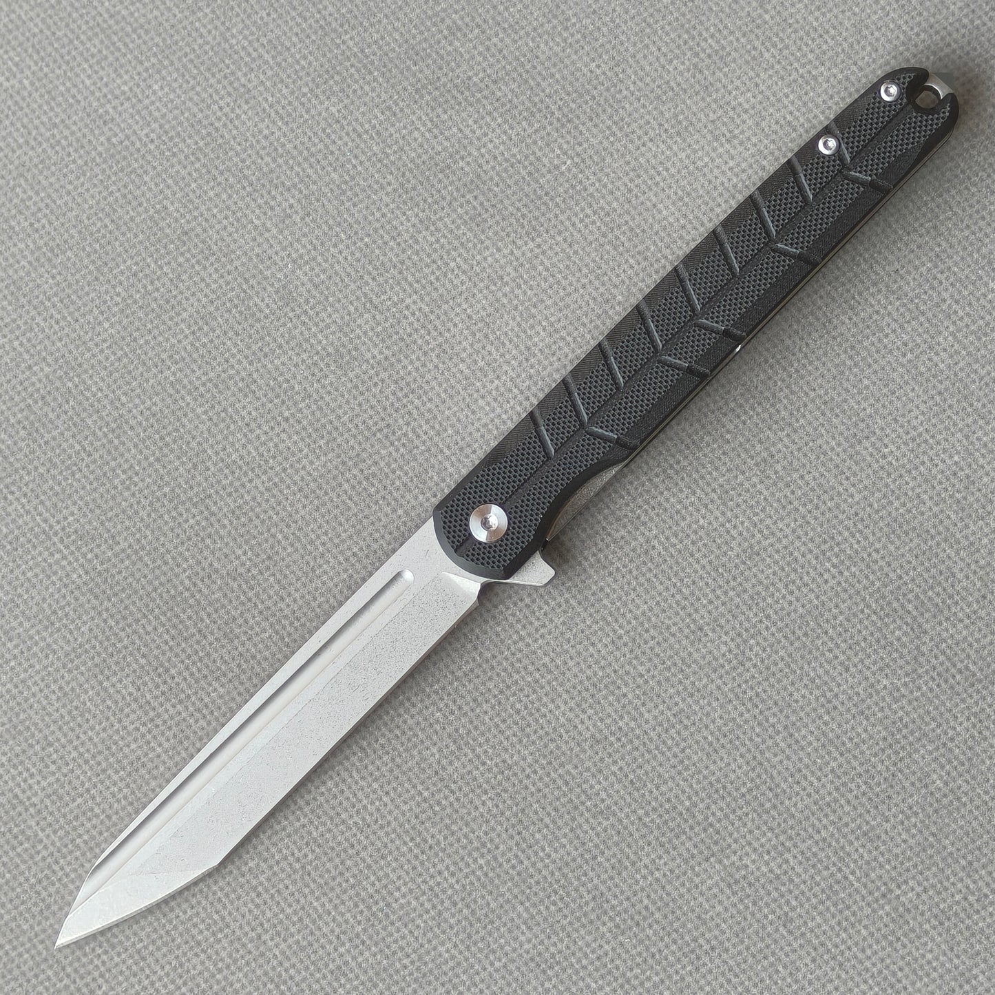 VORIXN KM001 D2 carbon fiber folding knife open non-clip side view with stonewashed blade, handle, and overall profile.
