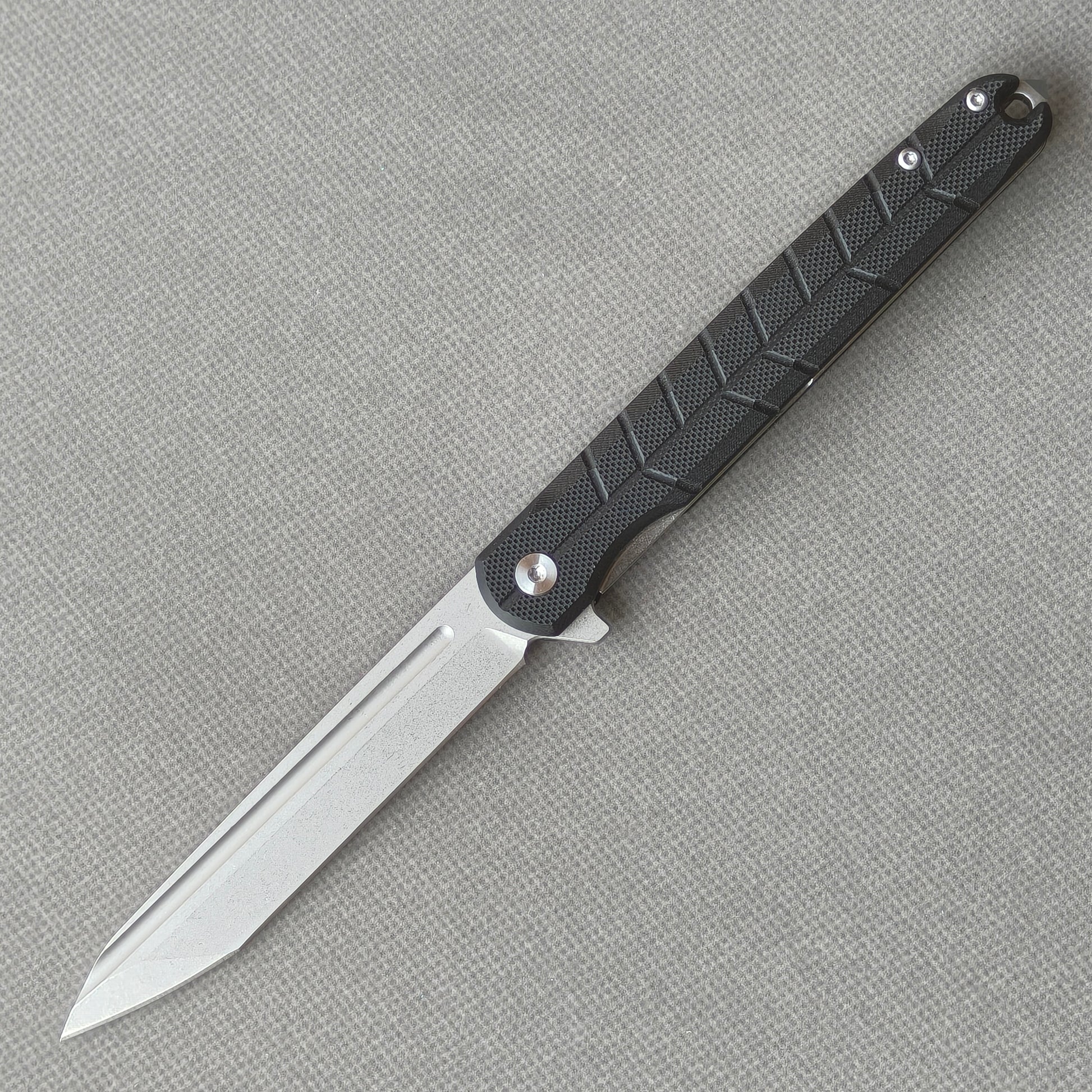 VORIXN KM001 D2 carbon fiber folding knife open non-clip side view with stonewashed blade, handle, and overall profile.