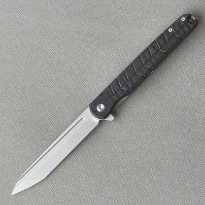 VORIXN KM001 D2 carbon fiber folding knife open non-clip side view with stonewashed blade, handle, and overall profile.