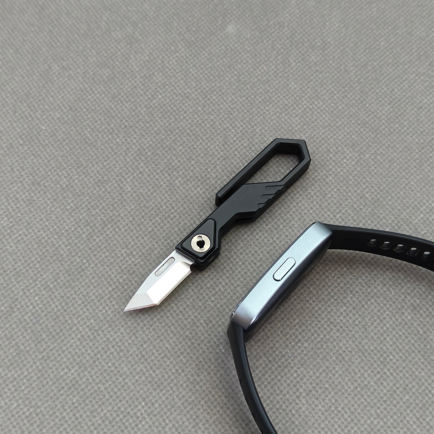 VORIXN NA001 Super Tiny Folding Knife – open view showing Aircraft-Grade Aluminum Alloy handle and Cr20Mo1V4 blade profile