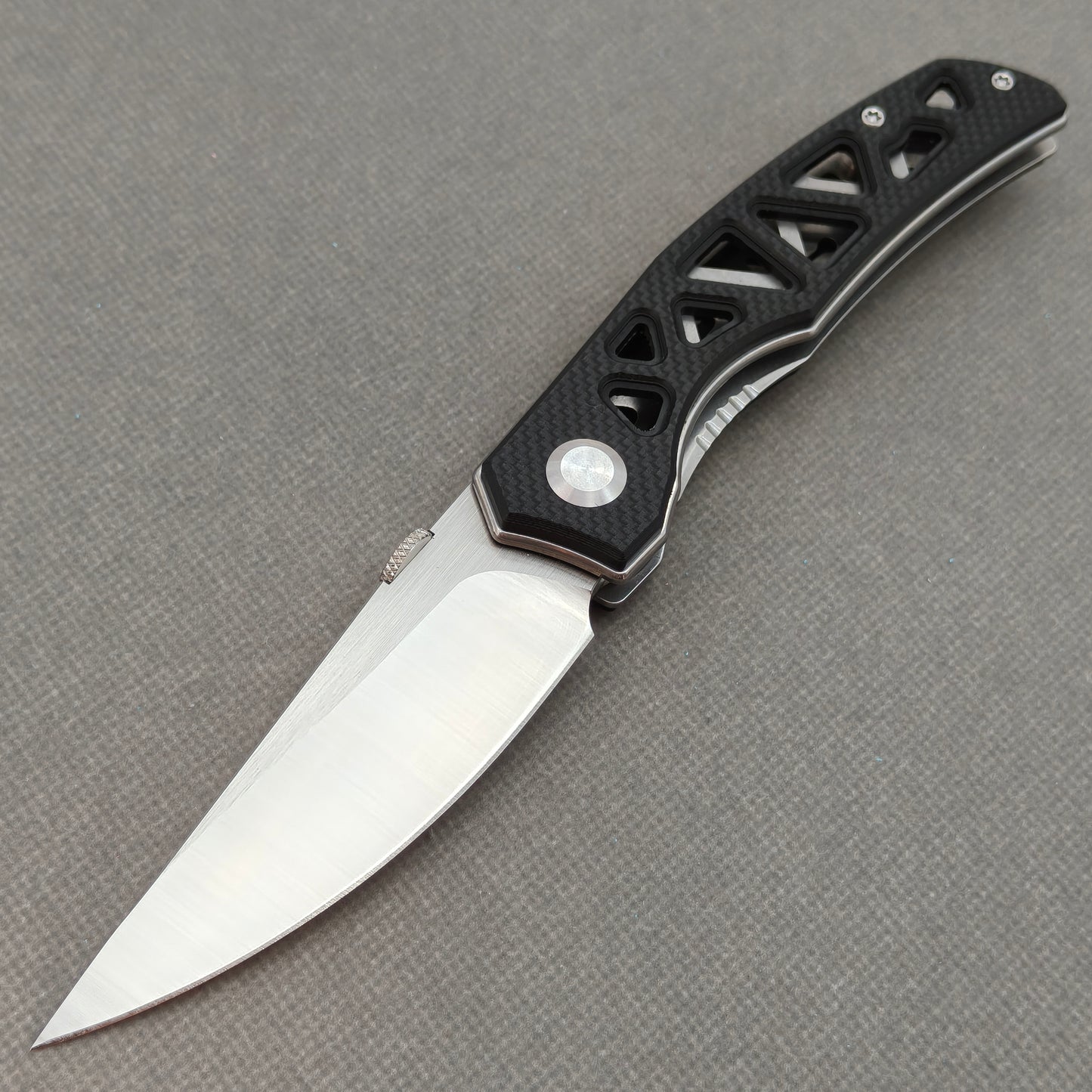 VORIXN KA003 9Cr13 stainless steel and black G10 folding knife open non-clip side view with blade, handle, and overall profile.