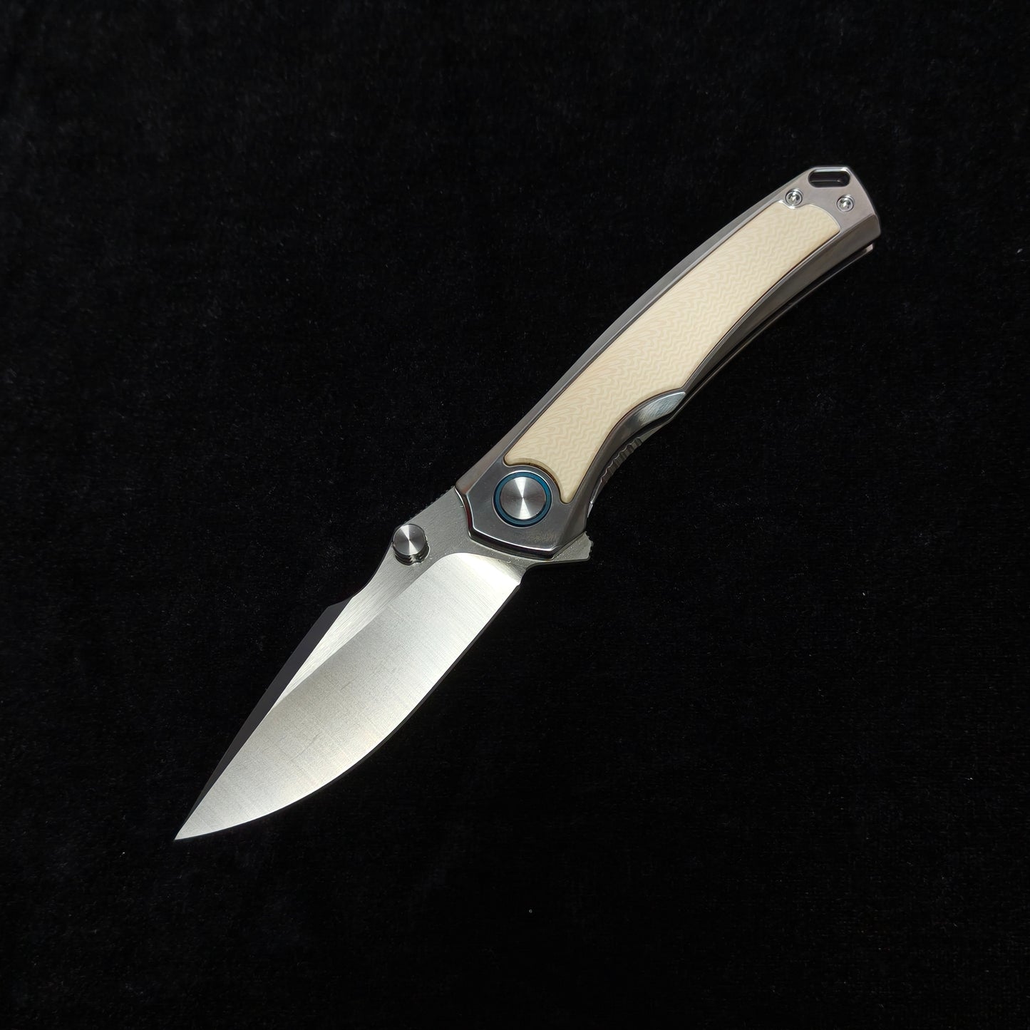 VORIXN LUCENT folding knife open, non-clip side, blade angled 45° bottom-left