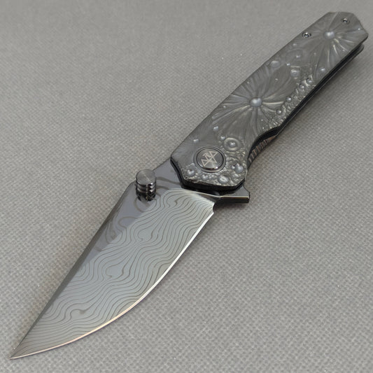 Vorixn “Impact Origin” Flipper & Thumb Stud Knife Titanium-Engraved Anodized Handle (3.6" Damascus steel Blade) KB098
