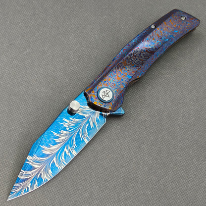 Vorixn "Aurora Bright" Flipper & Thumb Stud Knife Hand-Flamed Zirconium Handle (3.8" Feather Damascus Blade) KB110