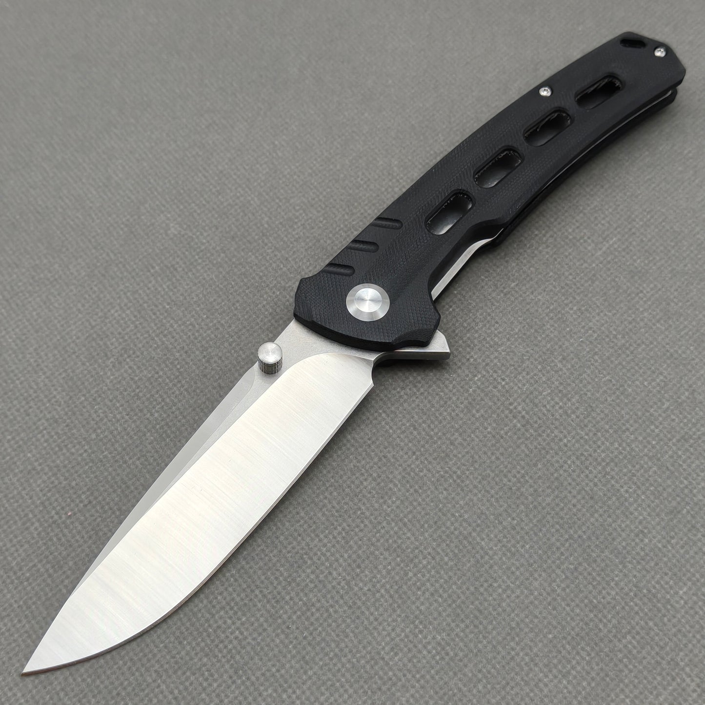 VORIXN KA001 9Cr13 stainless steel and black G10 folding knife open non-clip side view with blade, handle, and overall profile.
