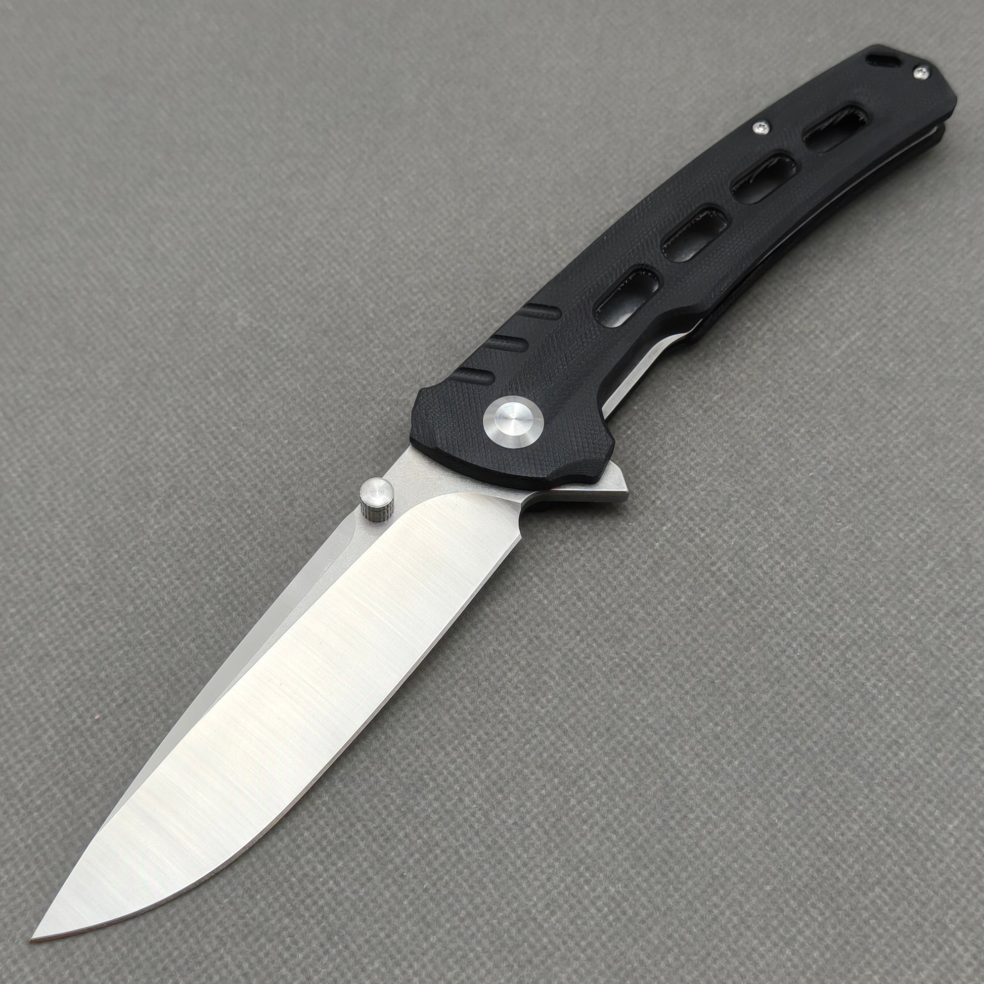 VORIXN KA001 9Cr13 stainless steel and black G10 folding knife open non-clip side view with blade, handle, and overall profile.