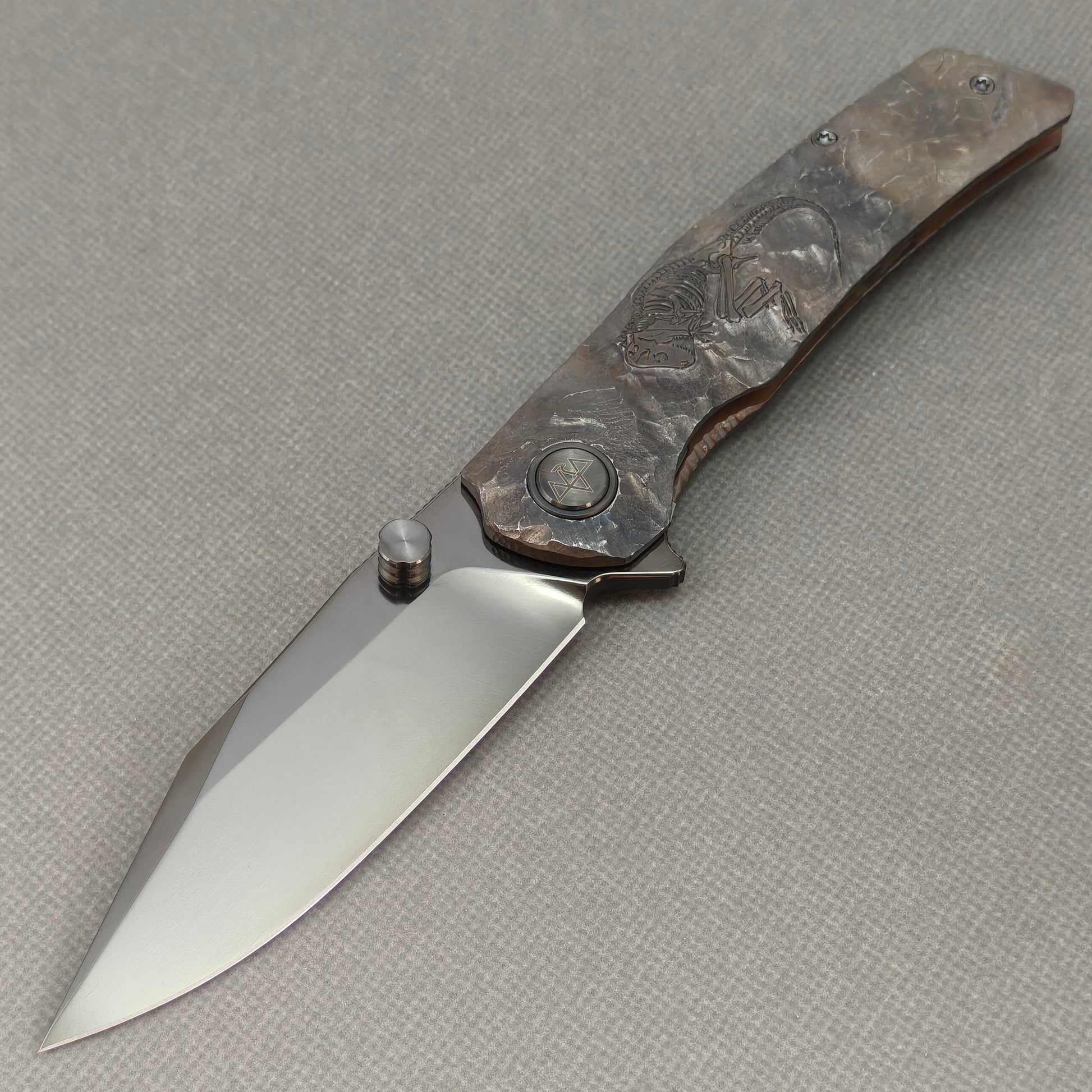 VORIXN Rex KB119 Folding Knife – open non-clip side view showing hand-engraved titanium handle and M390 blade profile