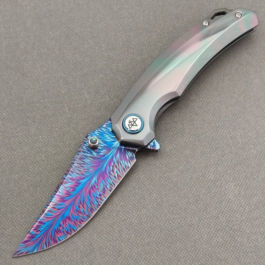 VORIXN PrismWake KB137 Folding Knife – open non-clip side view showing Zirconium handle and Damascus blade profile.