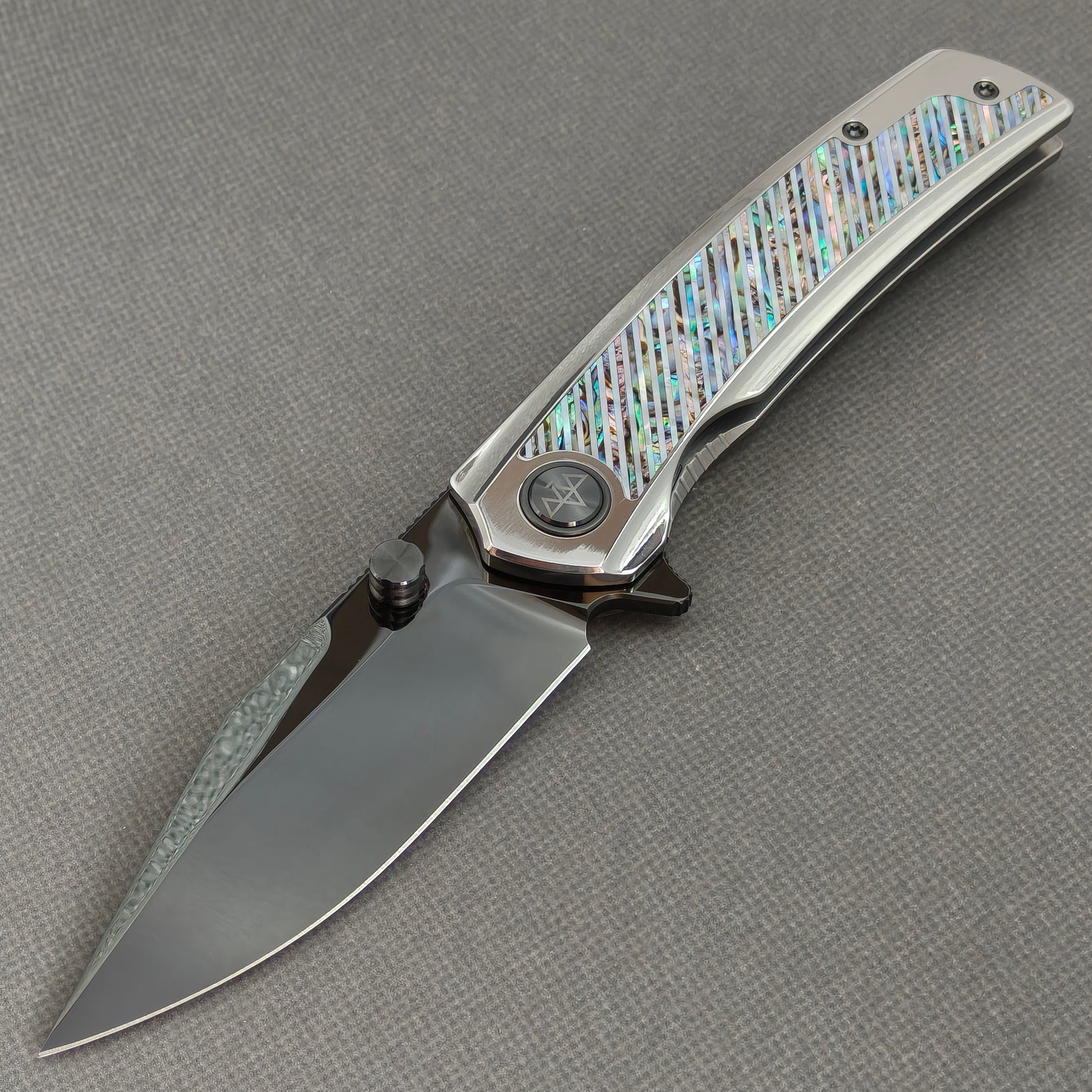 VORIXN KB103 Ocean Mirage Folding Knife – open non-clip side view showing Iridescent Mother-of-Pearl Inlaid Titanium handle and M390 blade profile