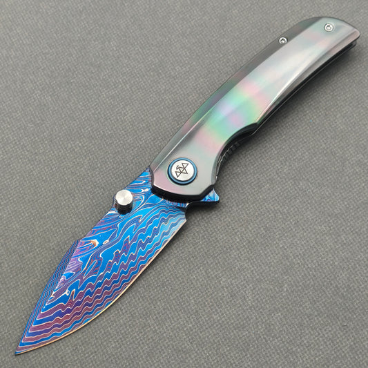VORIXN Spectra KB127 Folding Knife – open non-clip side view showing zirconium handle and Damascus blade profile