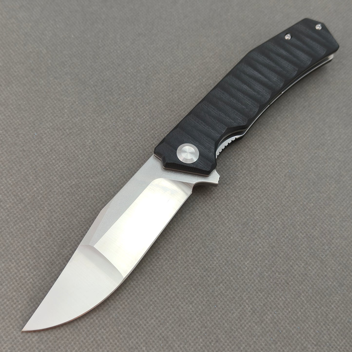 VORIXN KA002 9Cr13 stainless steel and black G10 folding knife open non-clip side view with blade, handle, and overall profile.