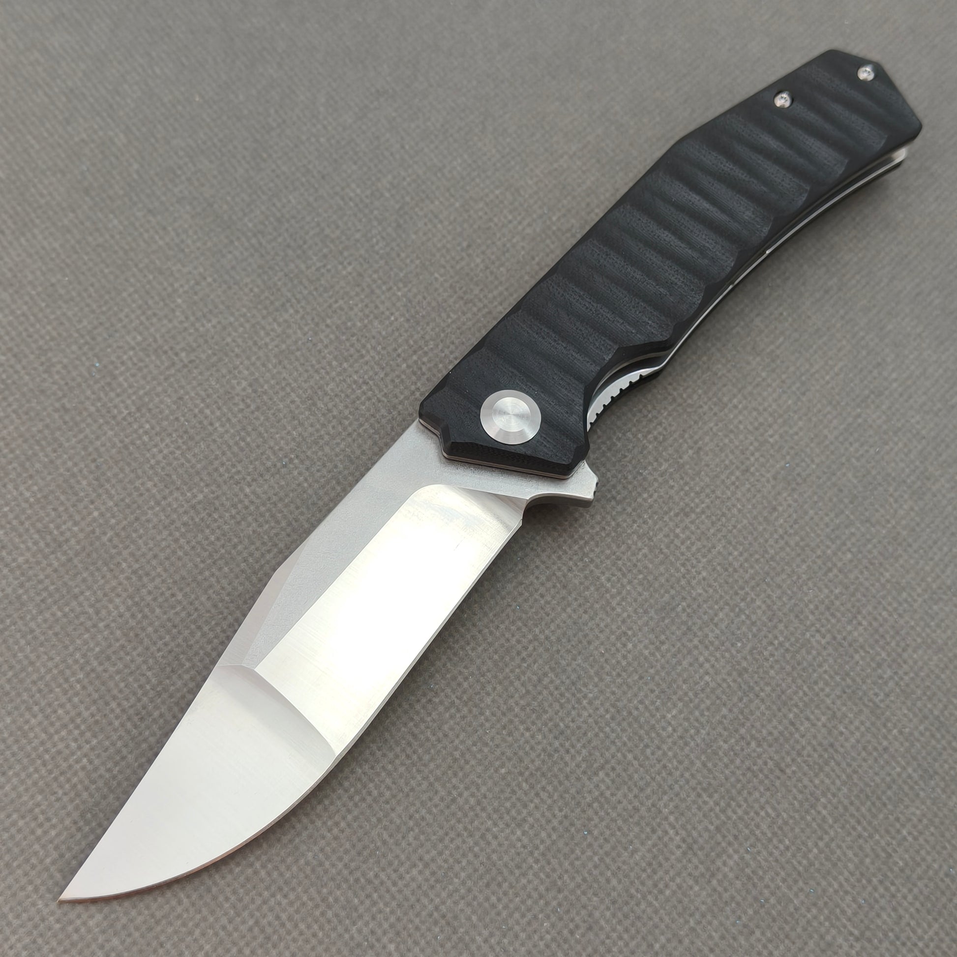 VORIXN KA002 9Cr13 stainless steel and black G10 folding knife open non-clip side view with blade, handle, and overall profile.