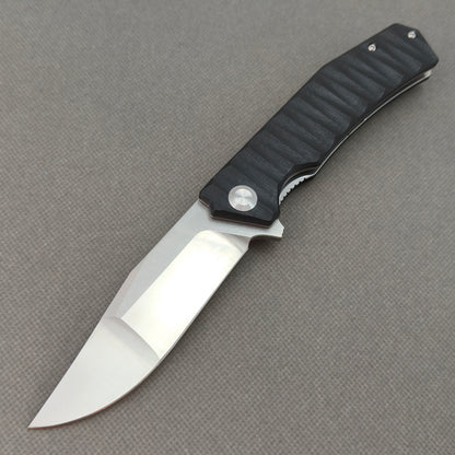 VORIXN KA002 9Cr13 stainless steel and black G10 folding knife open non-clip side view with blade, handle, and overall profile.