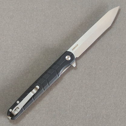 VORIXN KM001 blade detail showing D2 steel stonewashed finish and edge.