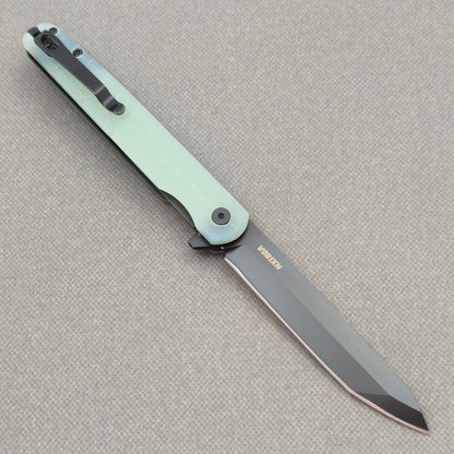 VORIXN KM004 open clip side view showing pocket clip and carbon fiber handle.