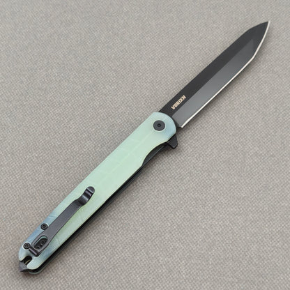 VORIXN KM004 blade detail showing D2 steel stonewashed finish and edge.