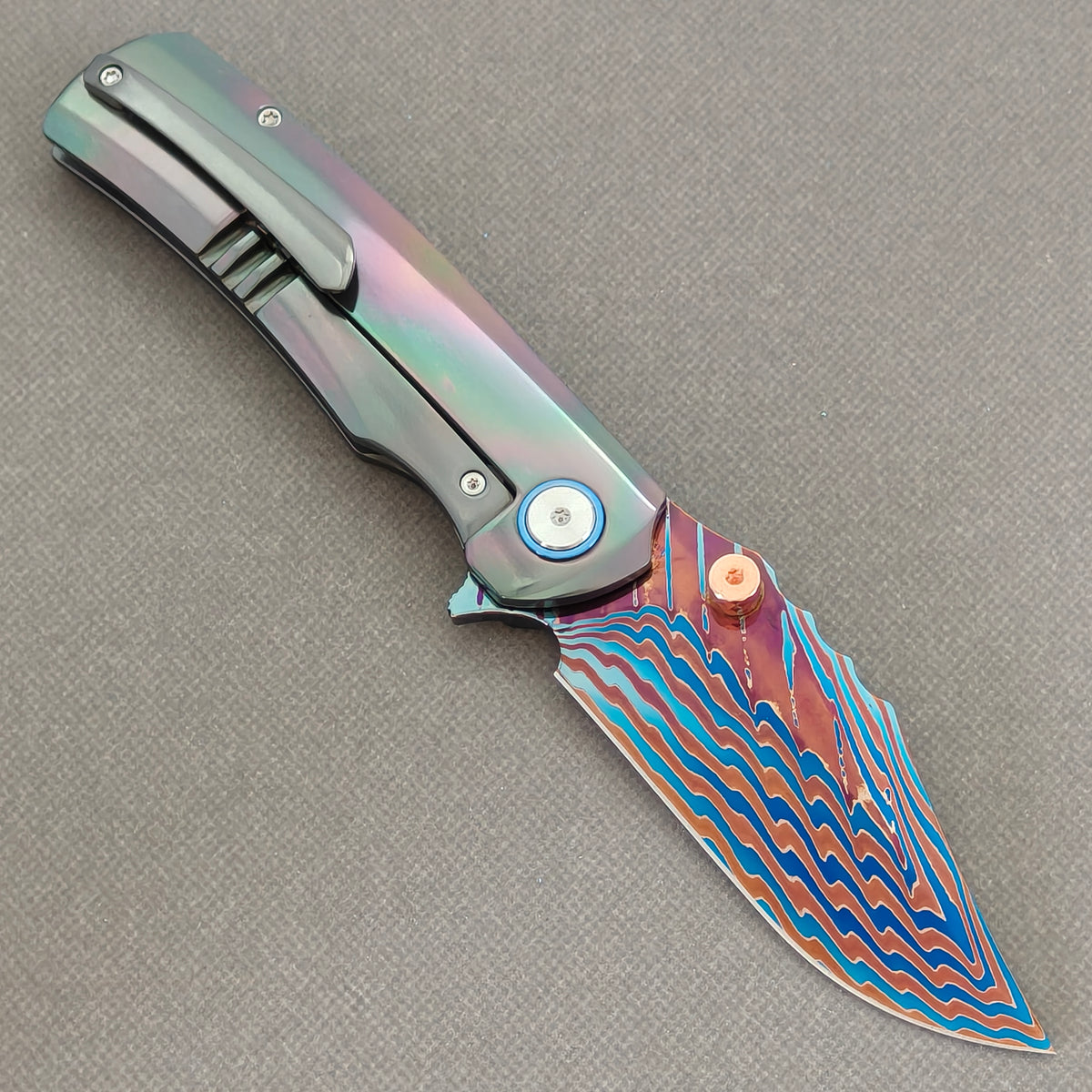 VORIXN Steelwraith KB143 Folding Knife – open clip side view showing pocket clip and Zirconium handle.