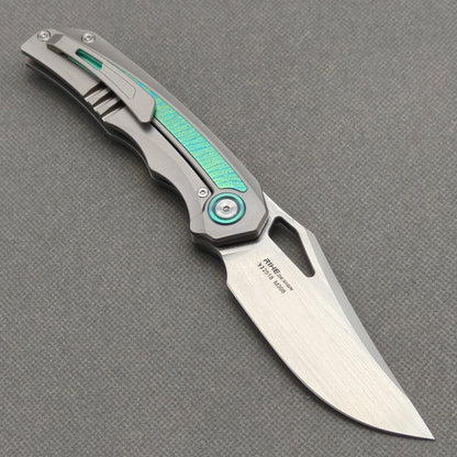 Couteau pliant RIHE Design, manche titane + titane cristallisé (lame Bohler M398 de 3,7") KB076