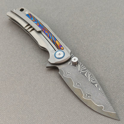 Vorixn „Nebula“ Flipper- und Daumenpin-Messer mit Griff aus Titanflammen-Zirkuinlay (3,8" Klinge aus Damaststahl) KB018 