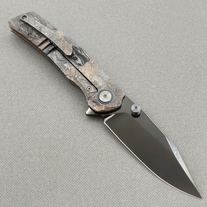 VORIXN Rex KB119 Folding Knife – open clip side view showing pocket clip and hand-engraved titanium handle