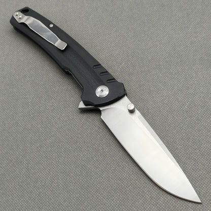 VORIXN KA001 open clip-side view showing pocket clip, black G10 handle structure, and overall profile.