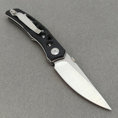 VORIXN KA003 open clip-side view showing pocket clip, black G10 handle structure, and overall profile.