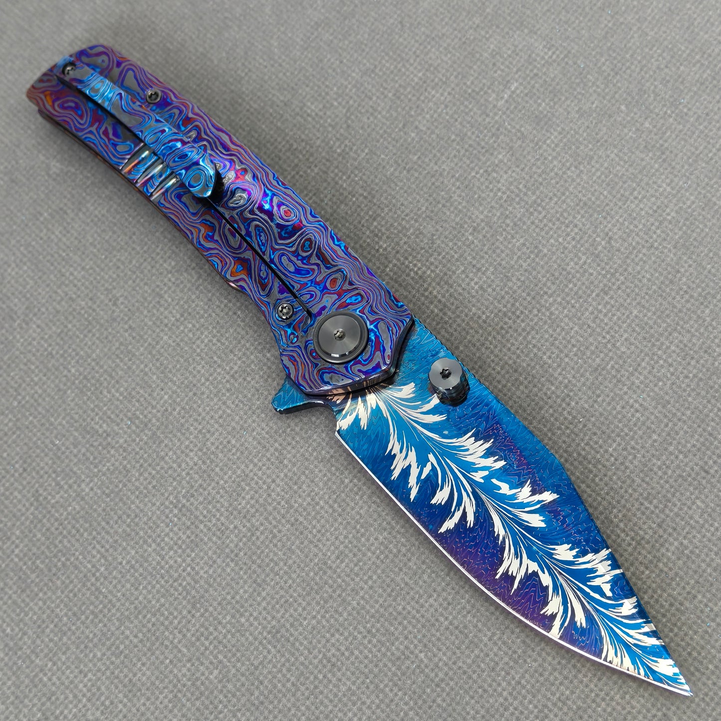VORIXN KB082 Aurora Black Folding Knife – open clip side view showing pocket clip and Zirconium handle