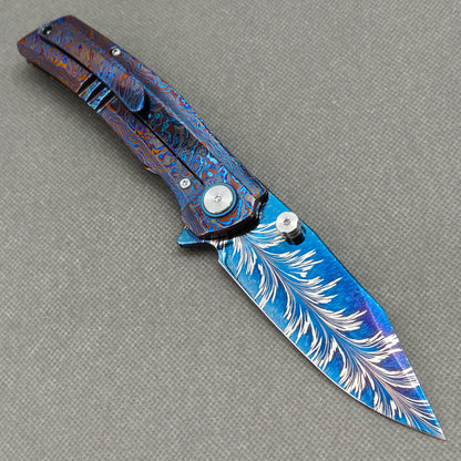 Vorixn "Aurora Bright" Flipper & Thumb Stud Knife Hand-Flamed Zirconium Handle (3.8" Feather Damascus Blade) KB110