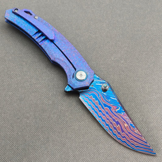 VORIXN Rimeflare KB132 Folding Knife – open clip side view showing pocket clip and Crystallized Titanium handle.