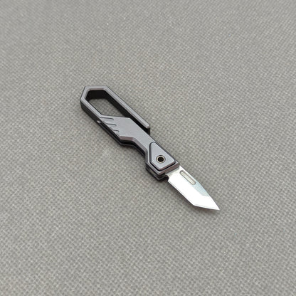 VORIXN NA005 Super Tiny Folding Knife – clip side view showing overall handle and blade