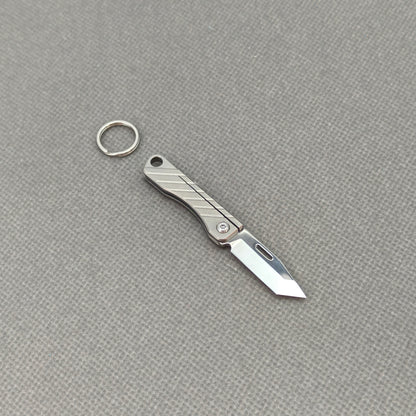 VORIXN NA002 Super Tiny Folding Knife – clip side view showing overall handle and blade