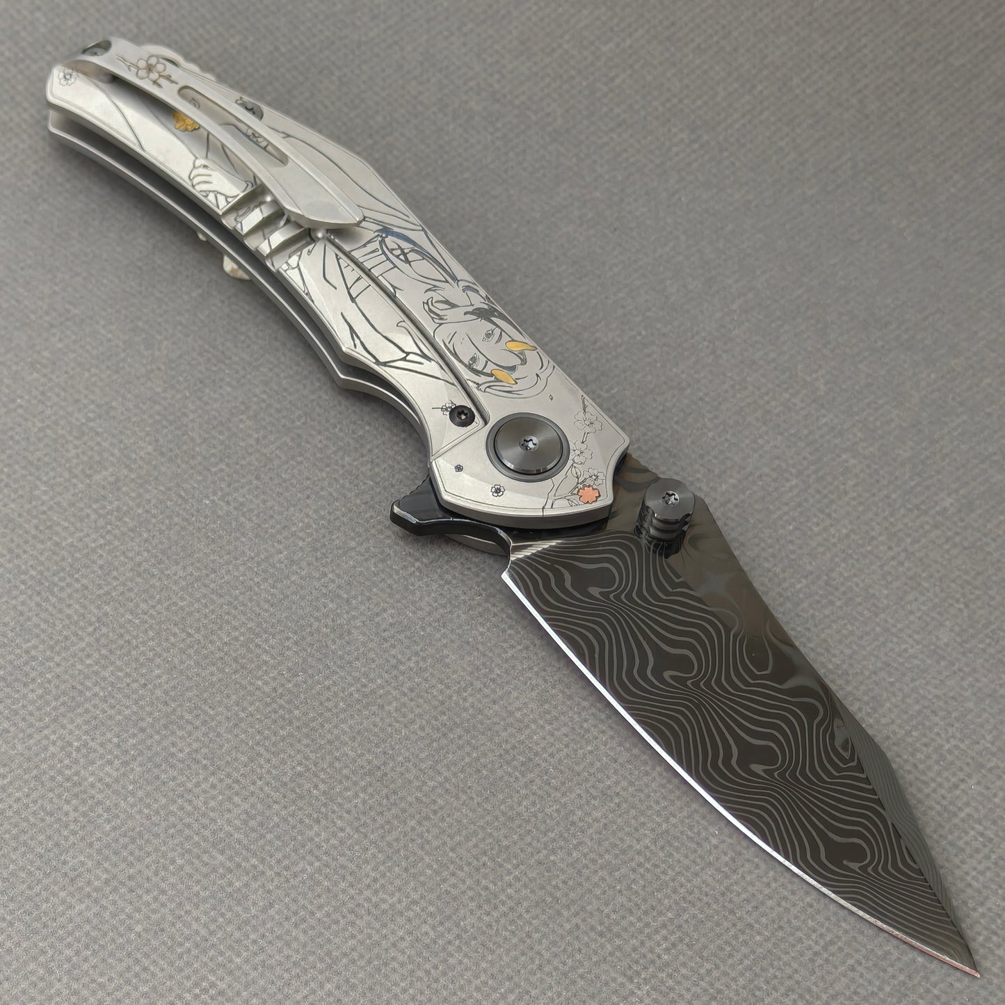 VORIXN Yokai KB106 Folding Knife – open clip side view showing pocket clip and Laser-Engraved Copper Accents Titanium handle