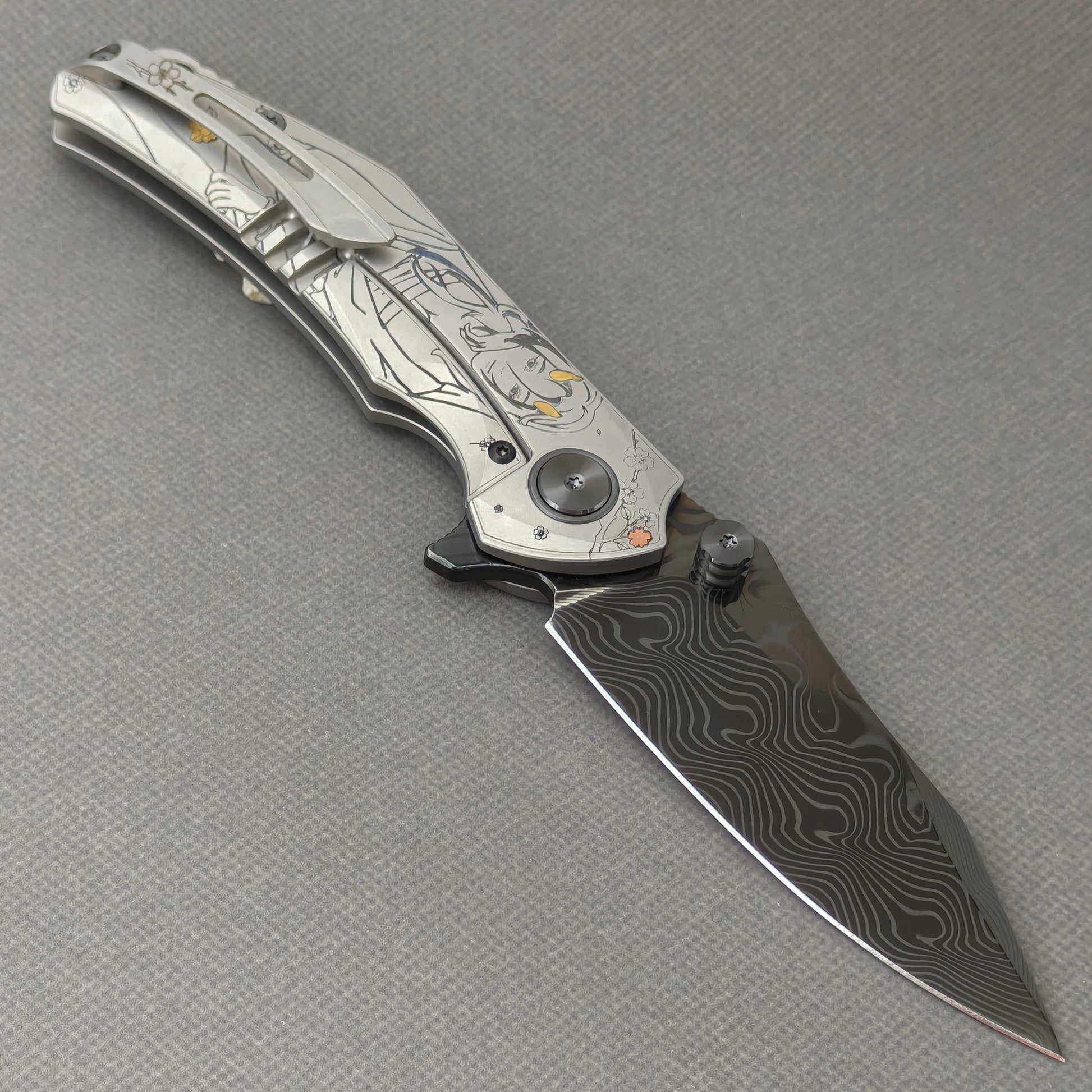 VORIXN Yokai KB106 Folding Knife – open clip side view showing pocket clip and Laser-Engraved Copper Accents Titanium handle